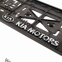 Рамка номера пластиковая с защелкой  "KIA MOTORS" черная (РК 01 01 00 (1.42)